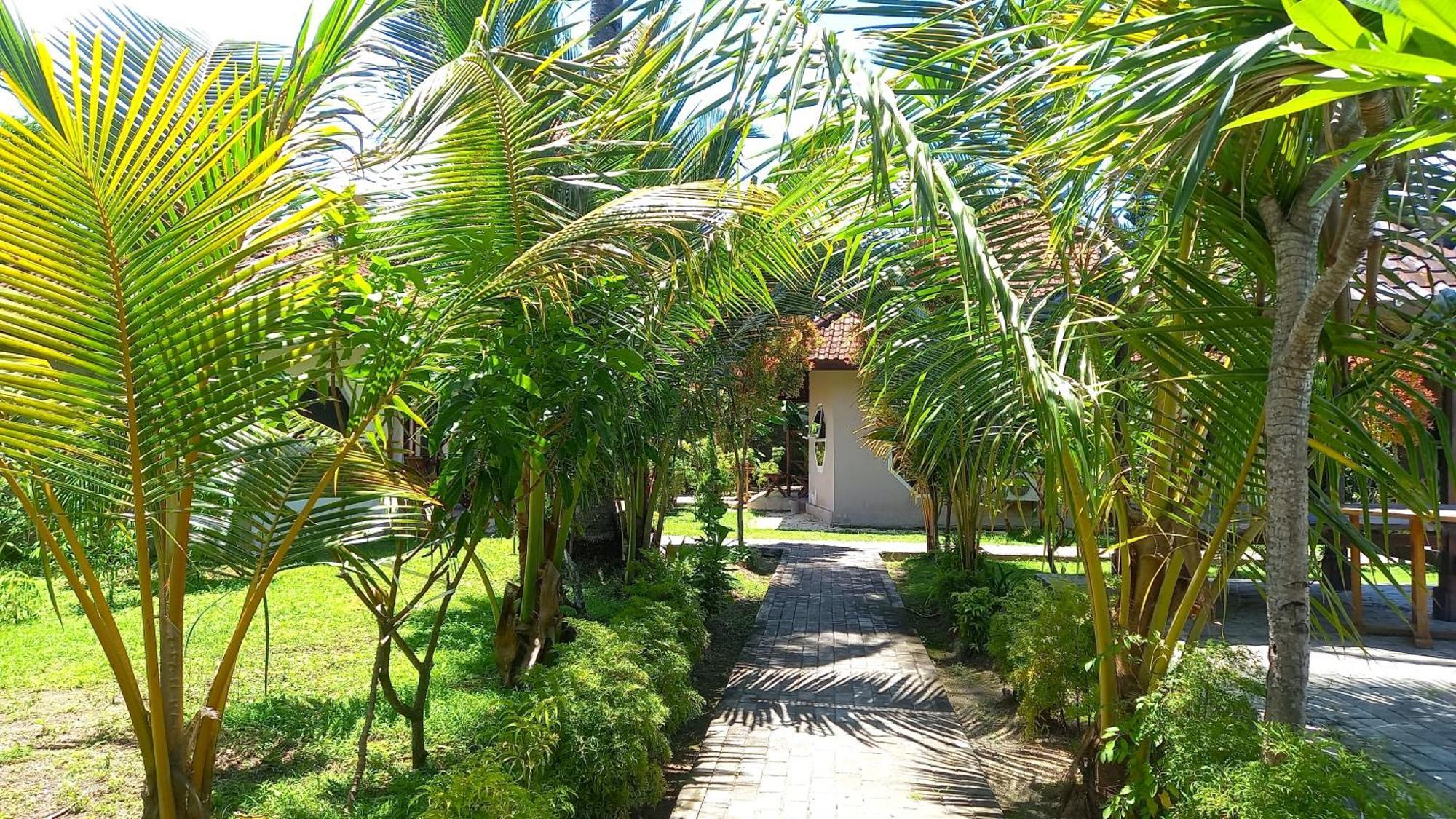 Gguesthouse Kuta  Bagian luar foto