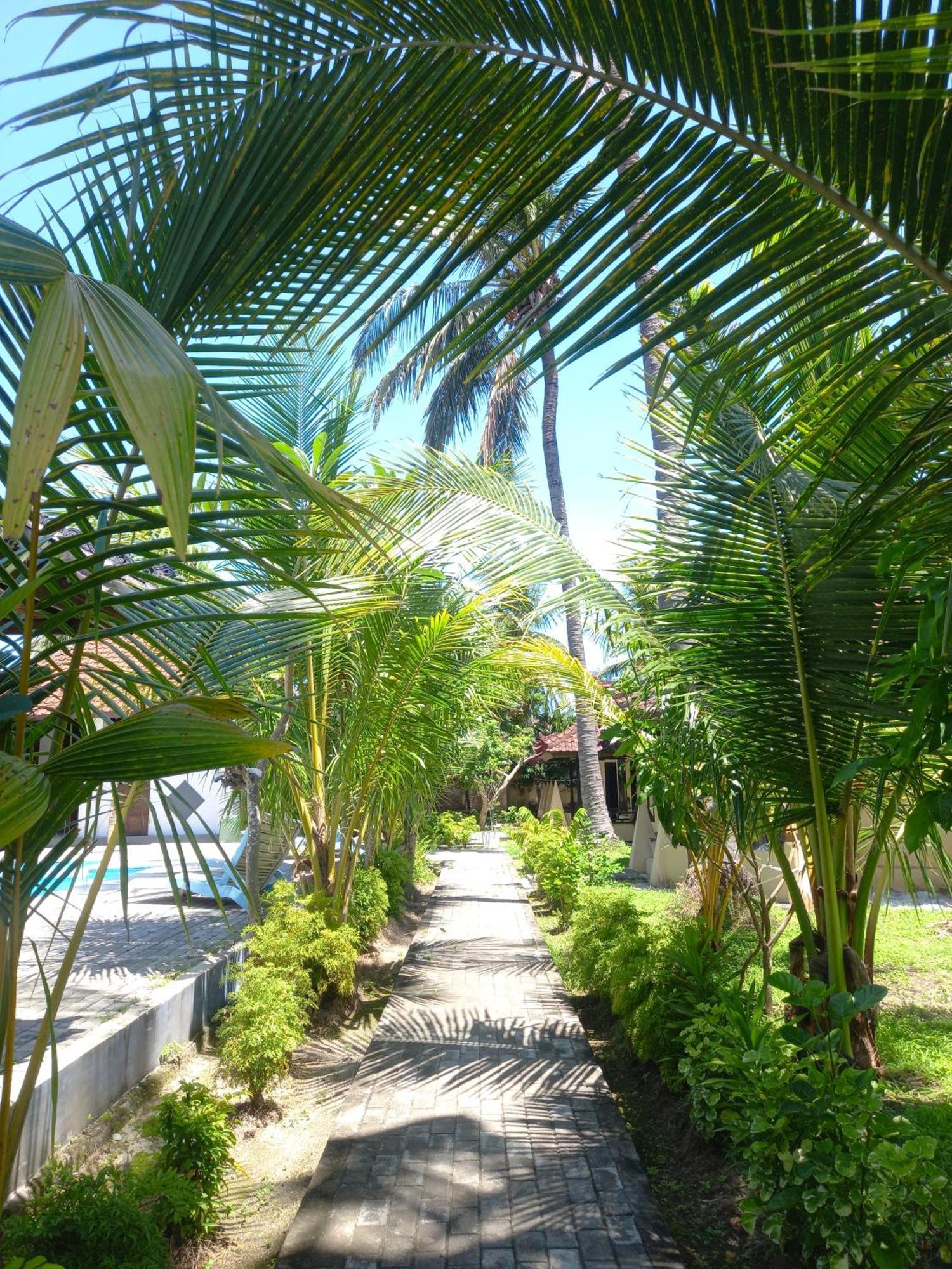 Gguesthouse Kuta  Bagian luar foto