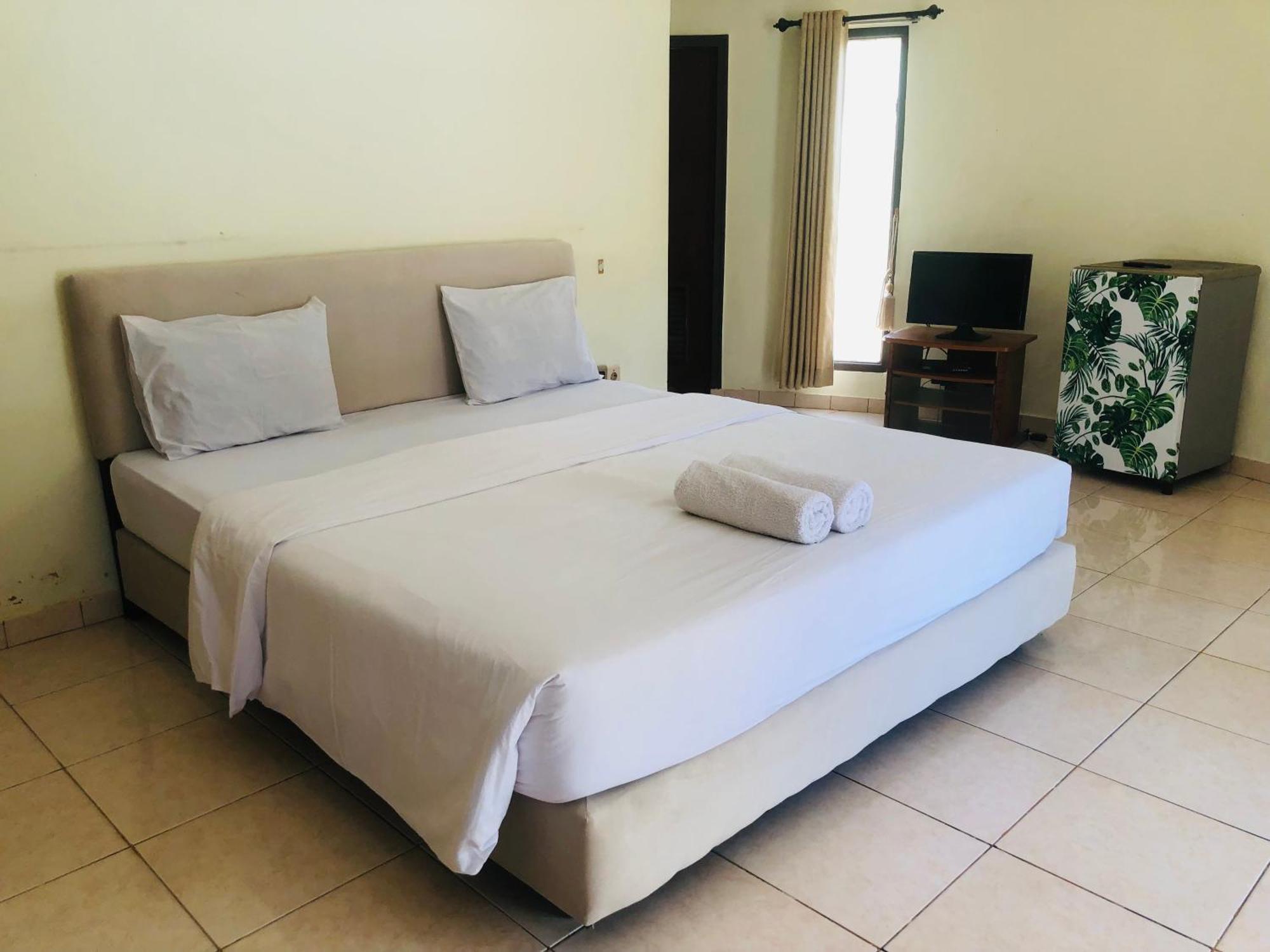 Gguesthouse Kuta  Bagian luar foto