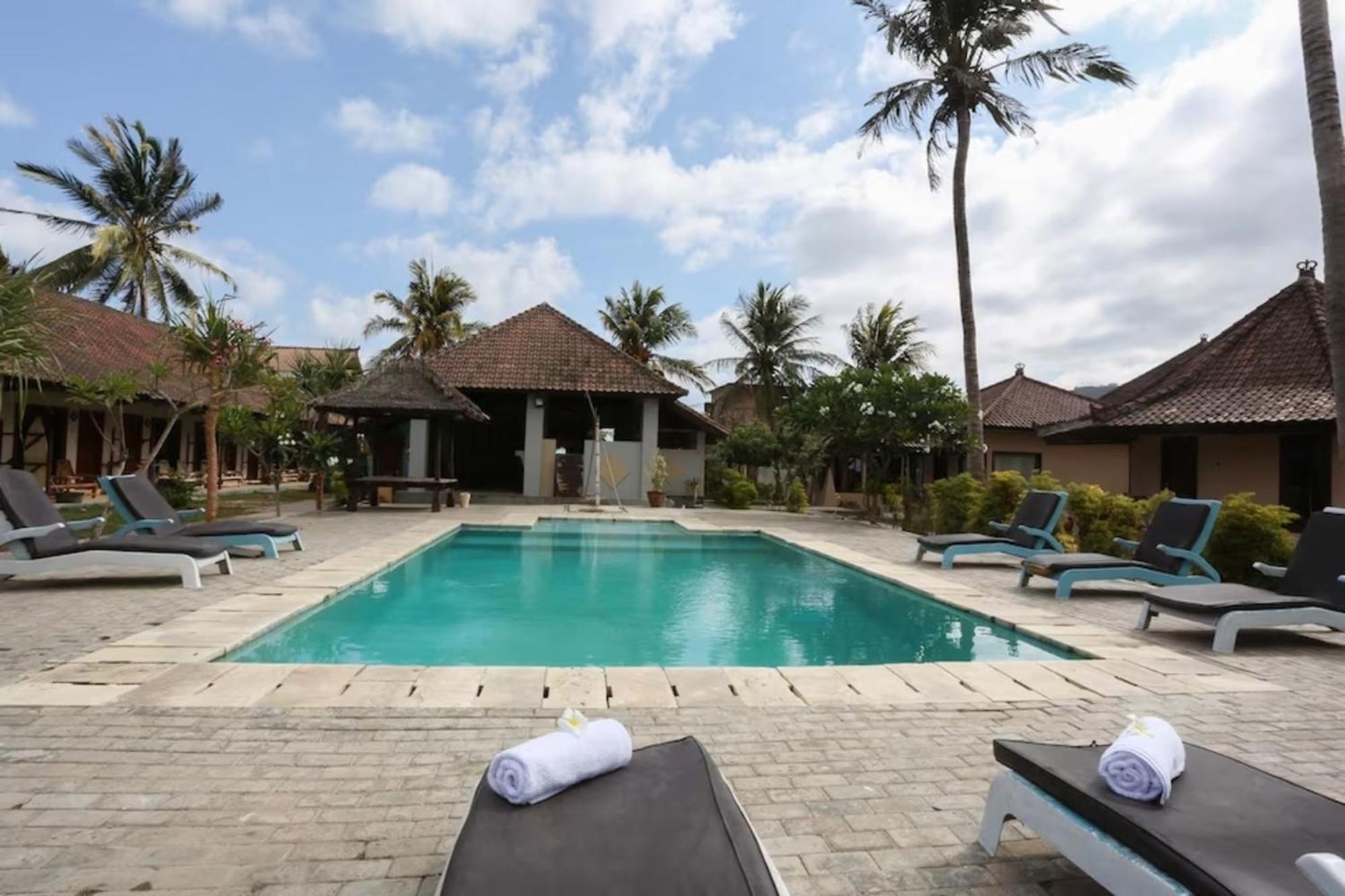 Gguesthouse Kuta  Bagian luar foto