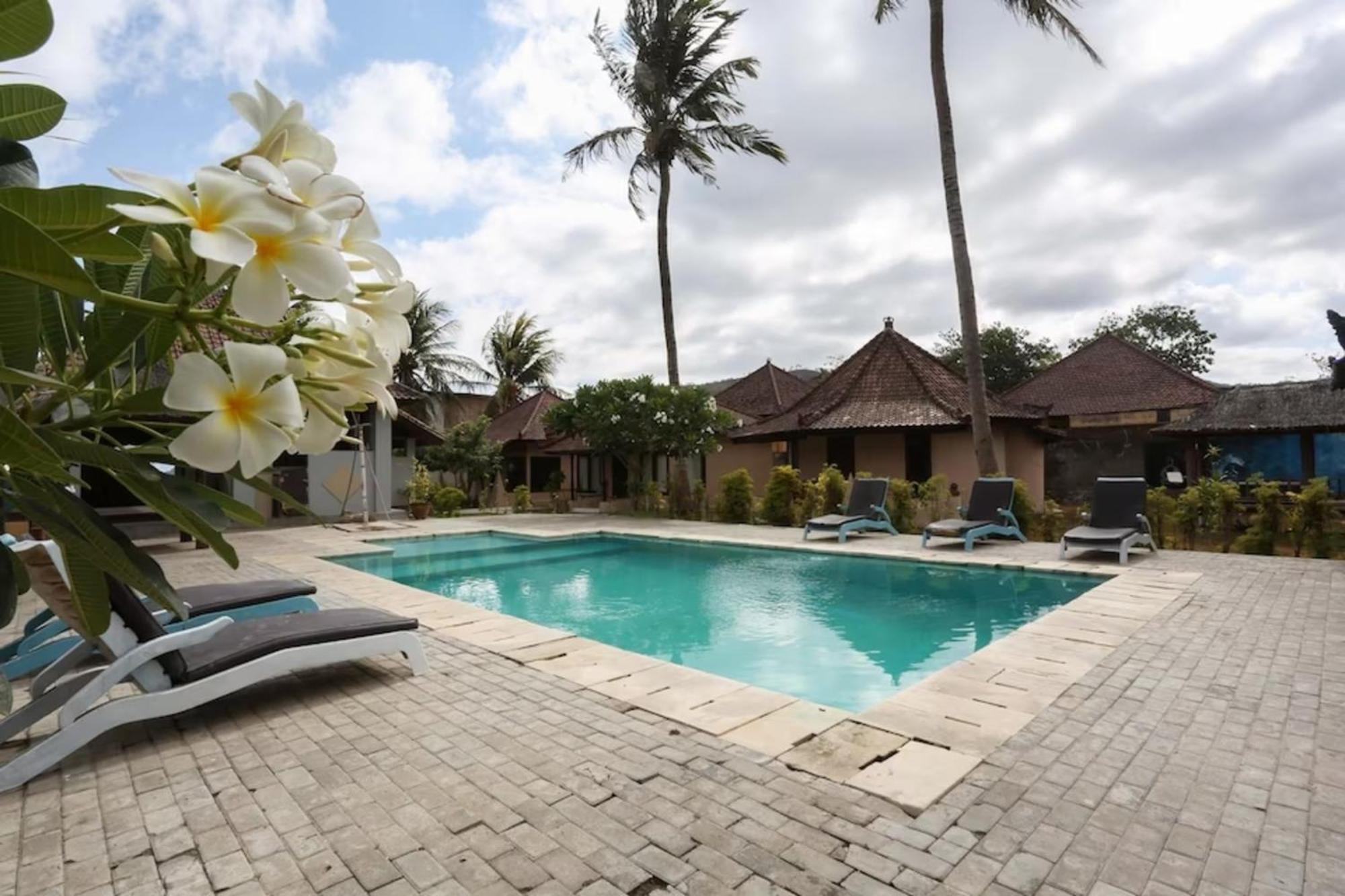 Gguesthouse Kuta  Bagian luar foto
