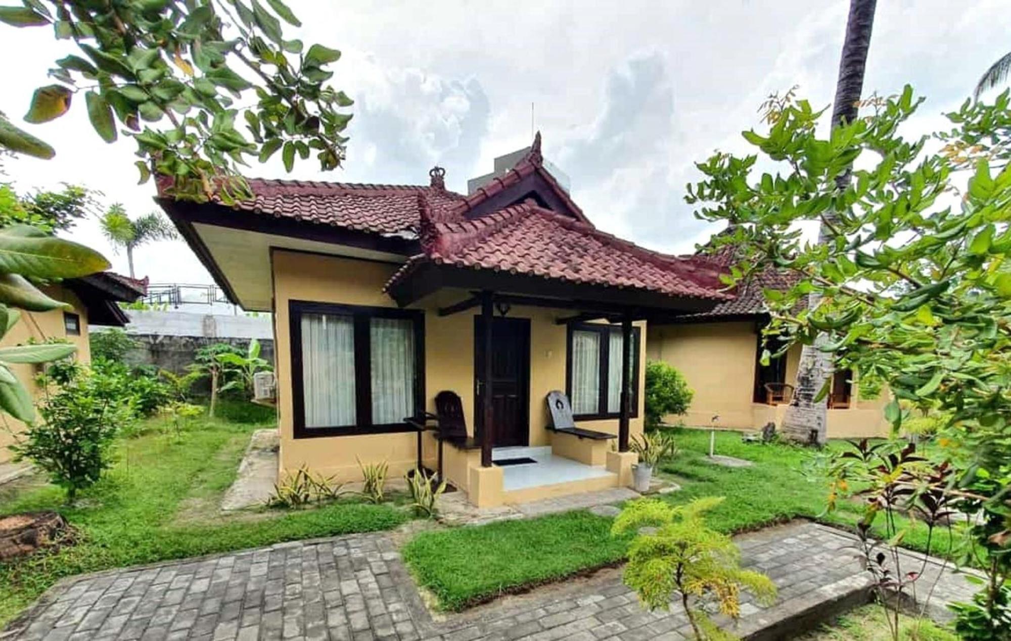 Gguesthouse Kuta  Bagian luar foto