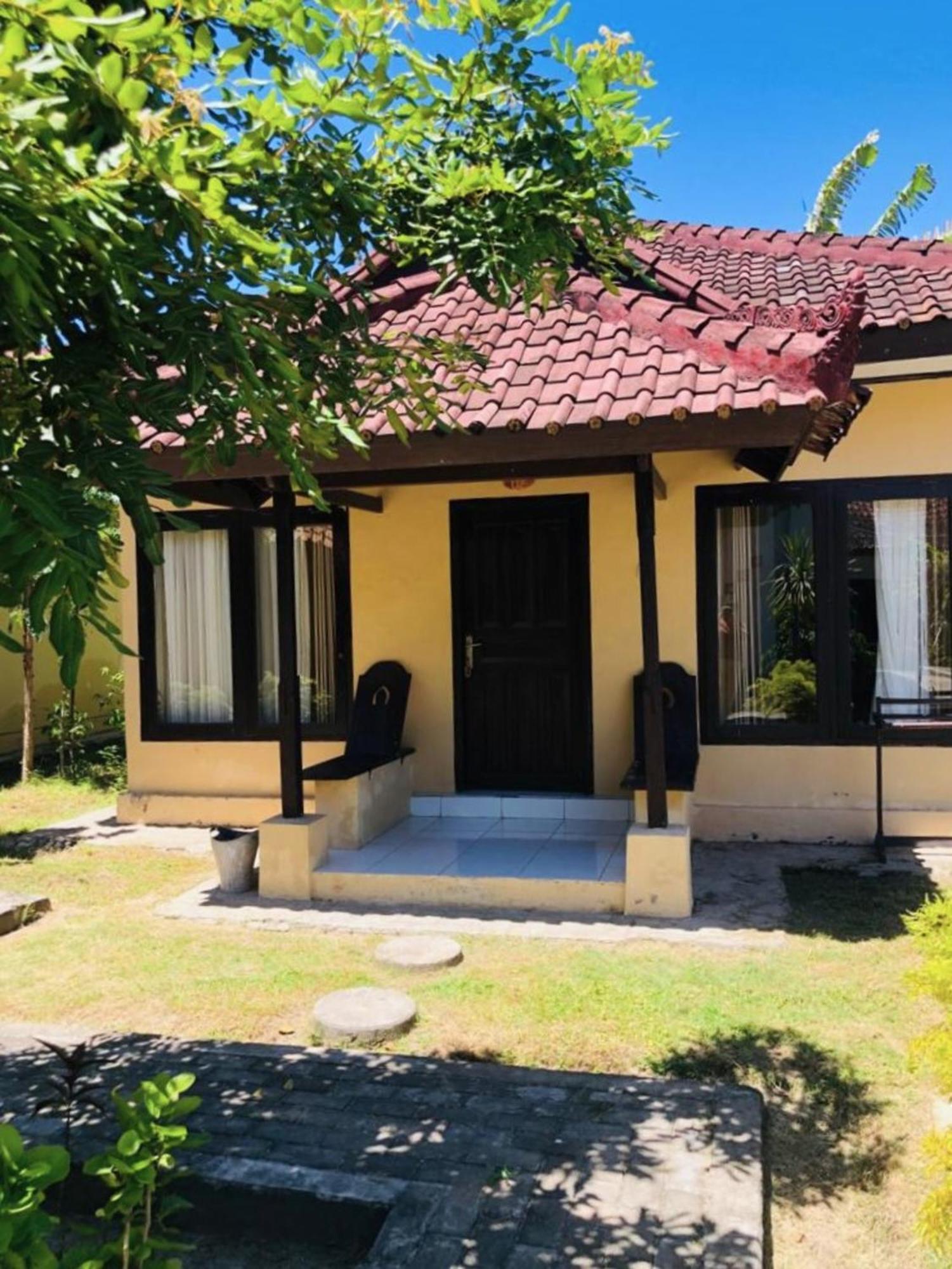 Gguesthouse Kuta  Bagian luar foto