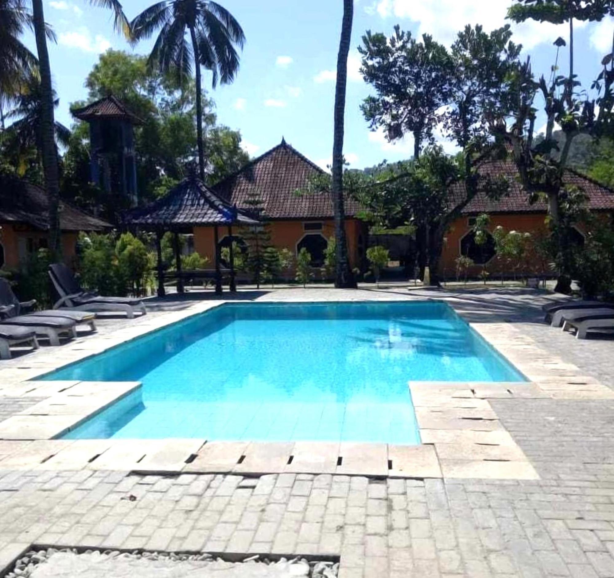 Gguesthouse Kuta  Bagian luar foto
