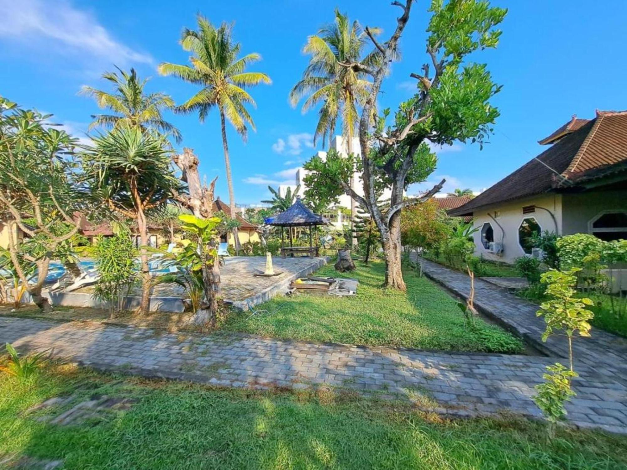 Gguesthouse Kuta  Bagian luar foto