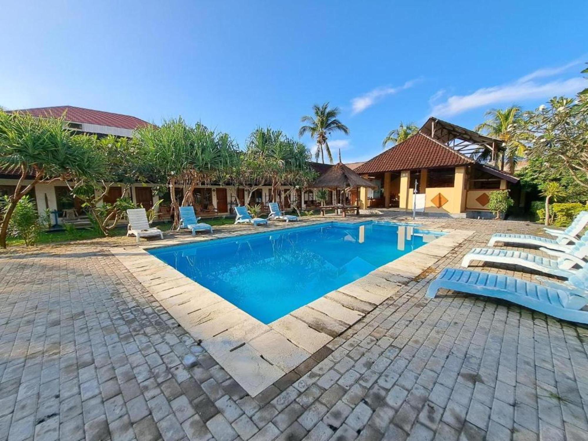 Gguesthouse Kuta  Bagian luar foto